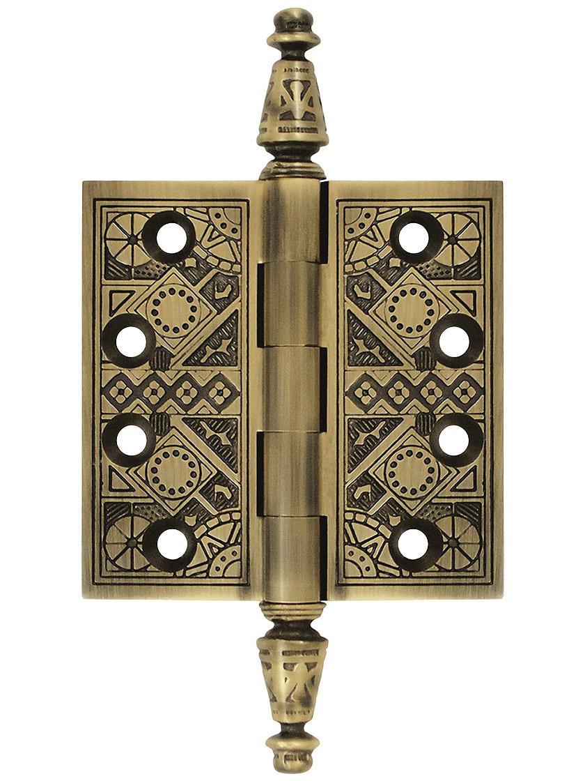 3 1/2 inch Premium Brass Aesthetic Pattern Hinge With Decorative Steeple Tips In Antique Brass